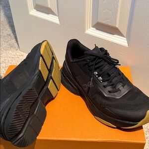 On Running Black and Tan Sneakers